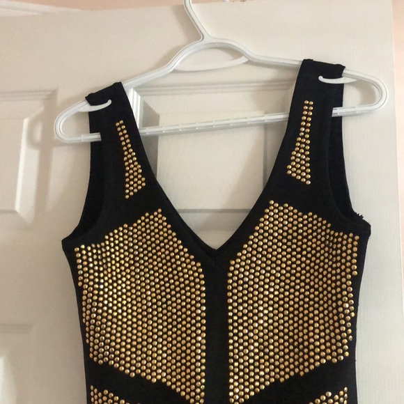 Short dress with golden studs - Picture 3 of 6